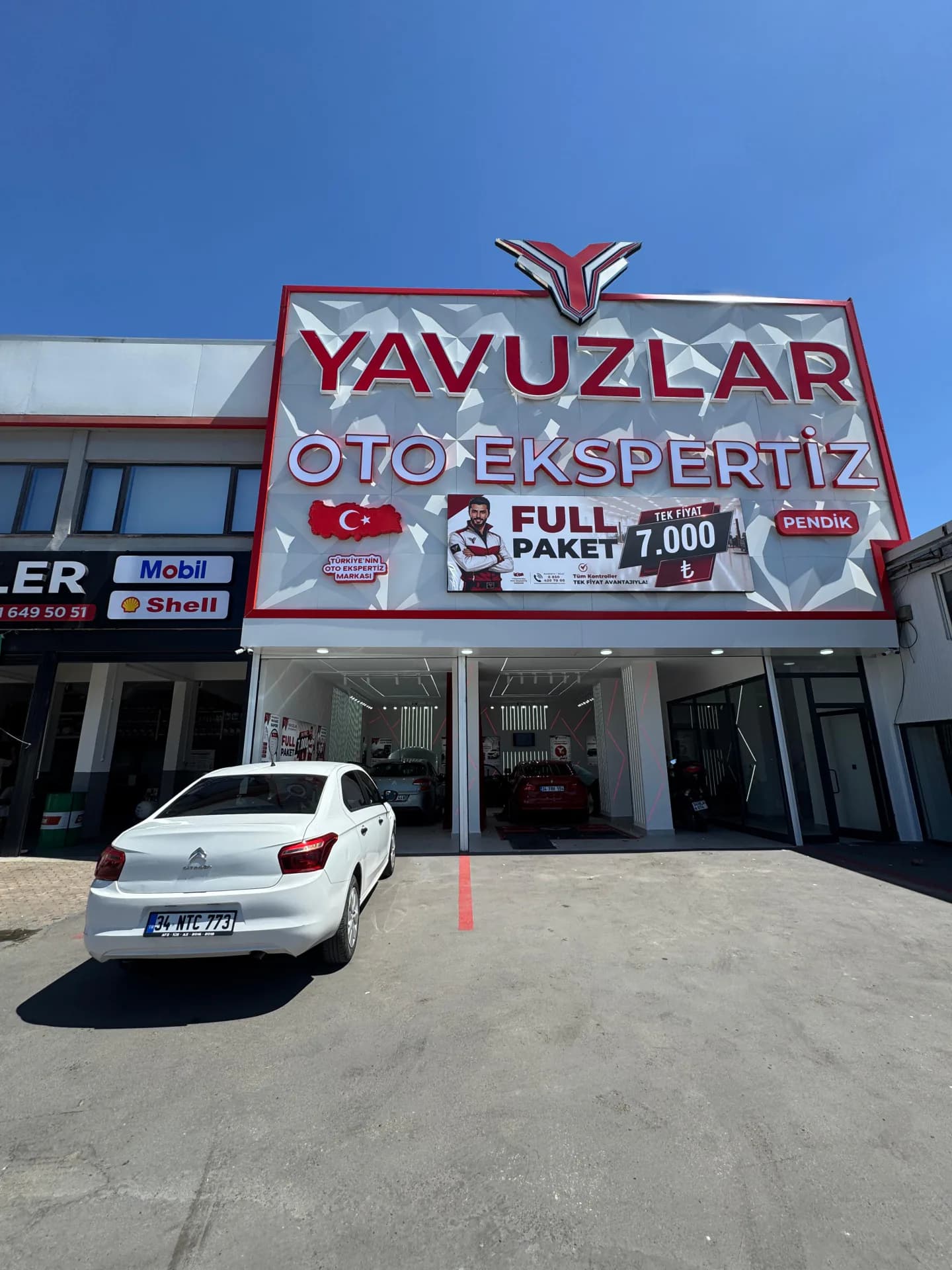 Kartal Oto Ekspertiz — Yavuzlar Pendik E-5 istasyonunun dış cephesi ve tabelası